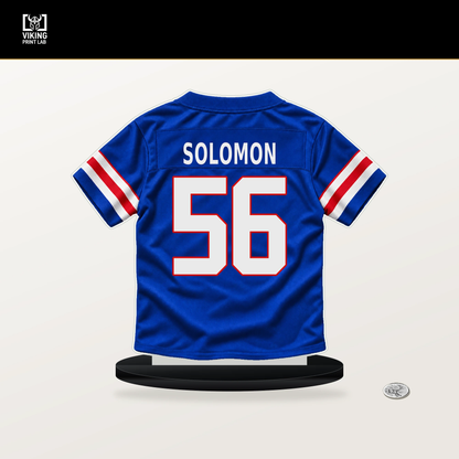 Javon Solomon number 56 Buffalo Bills jersey stand with included black base.