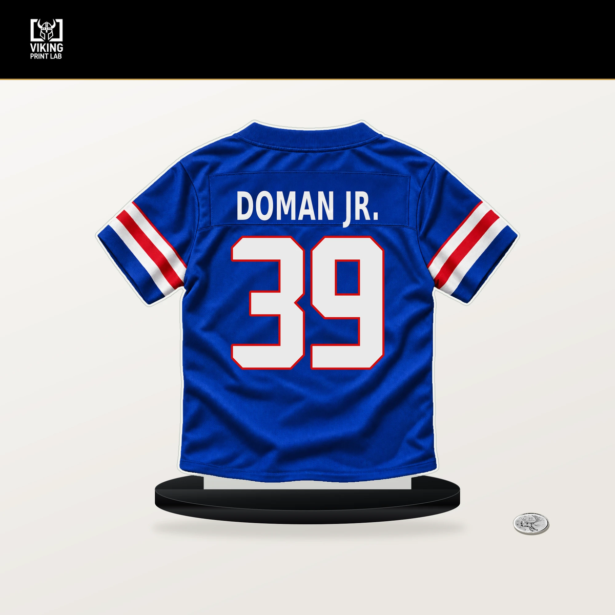 Tommy Doman Jr. number 39 Buffalo Bills jersey stand with included black base.