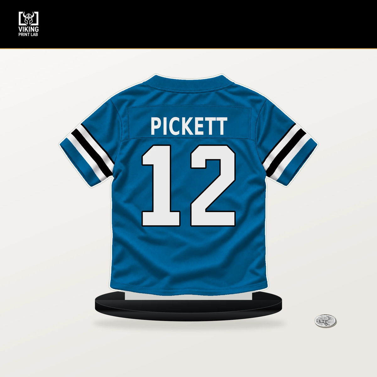 Kenny Pickett number 12 Carolina Panthers jersey stand with included black base.