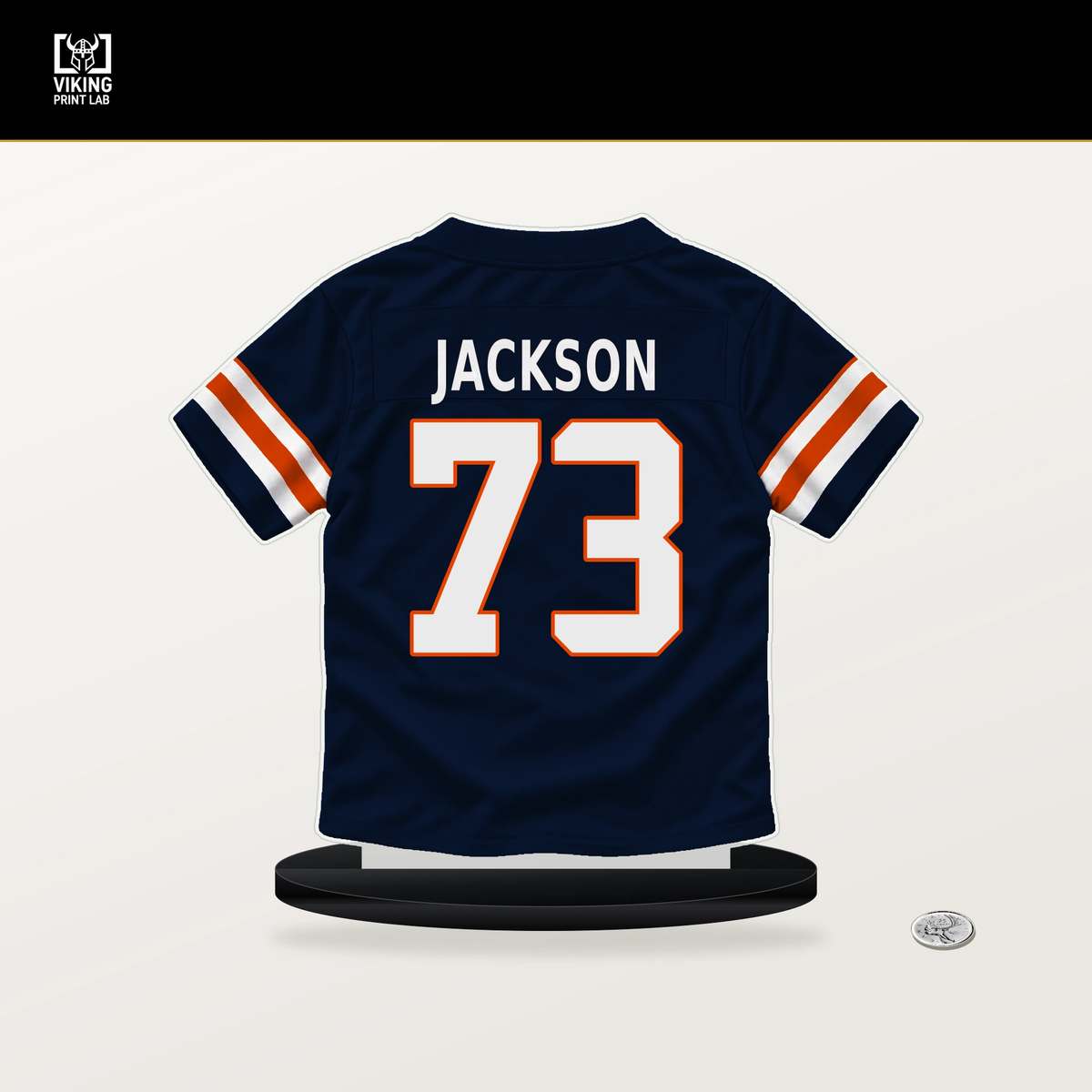 Jonah Jackson number 73 Chicago Bears jersey stand with included black base.
