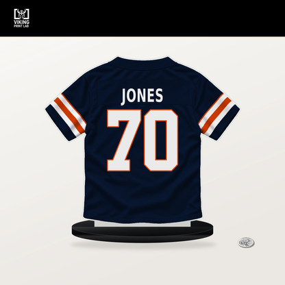 Braxton Jones number 70 Chicago Bears jersey stand with included black base.