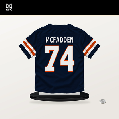 Jordan McFadden number 74 Chicago Bears jersey stand with included black base.