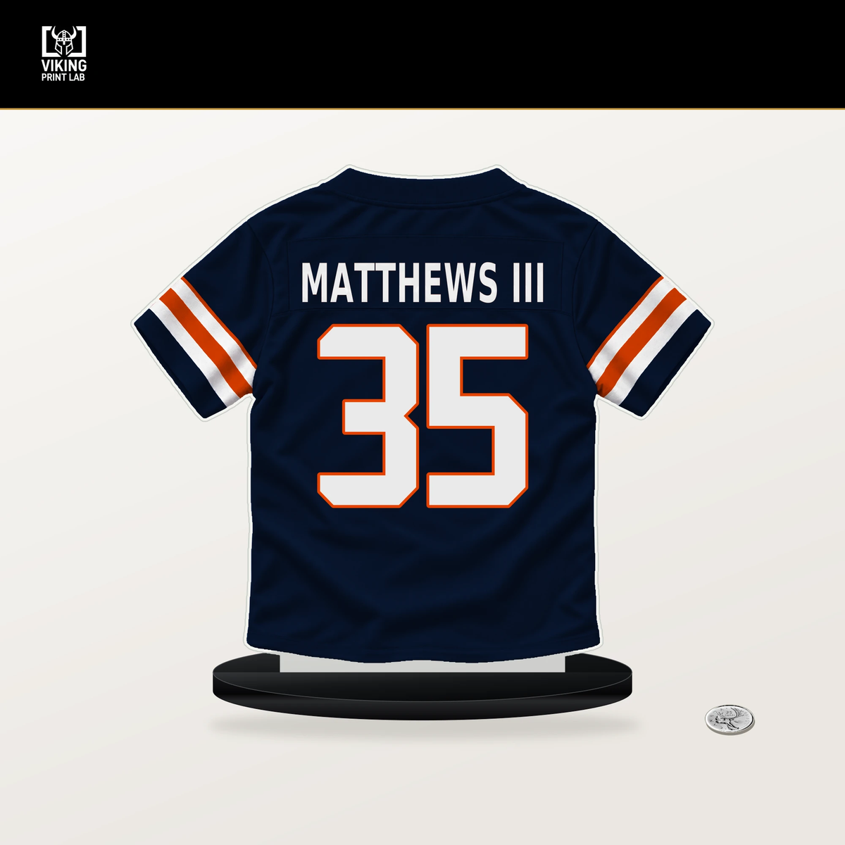 Wayne Matthews III number 35 Chicago Bears jersey stand with included black base.