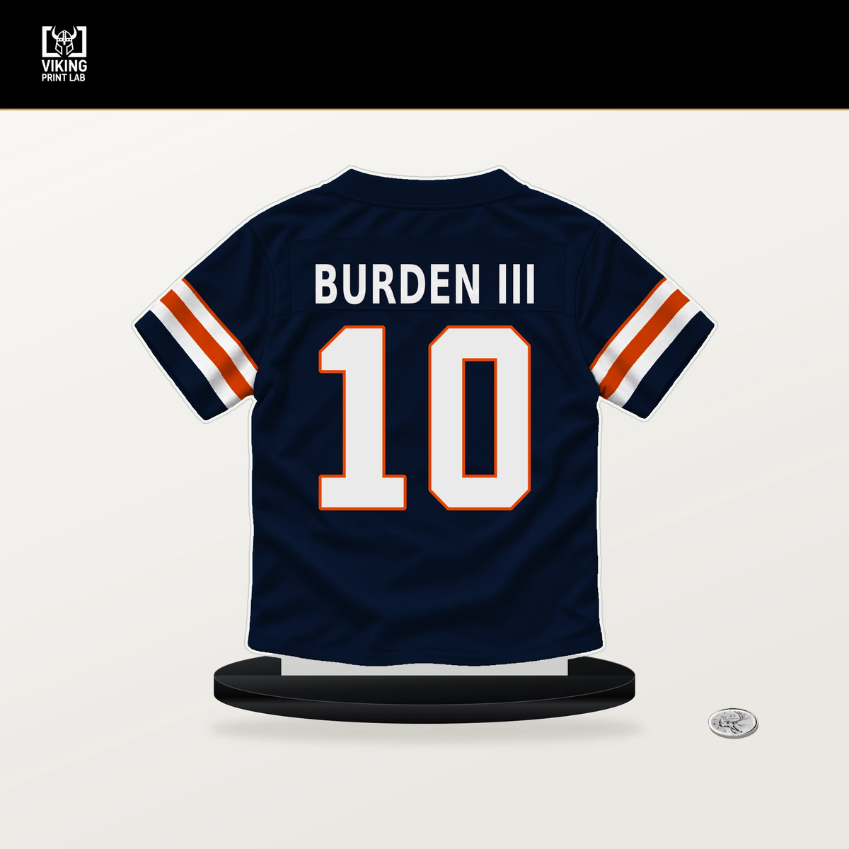 Luther Burden III number 10 Chicago Bears jersey stand with included black base.