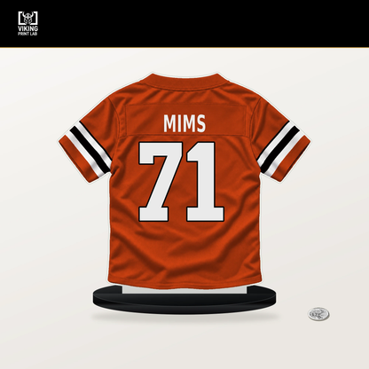 Amarius Mims number 71 Cincinnati Bengals jersey stand with included black base.