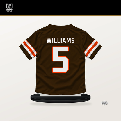 Quincy Williams number 5 Cleveland Browns jersey stand with included black base.