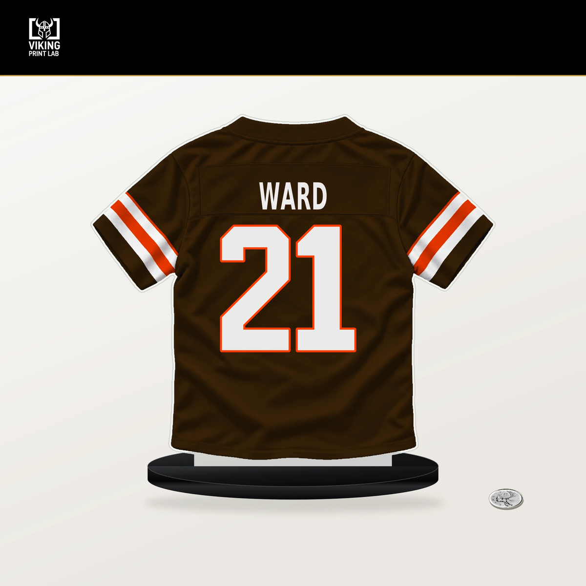 Denzel Ward number 21 Cleveland Browns jersey stand with included black base.