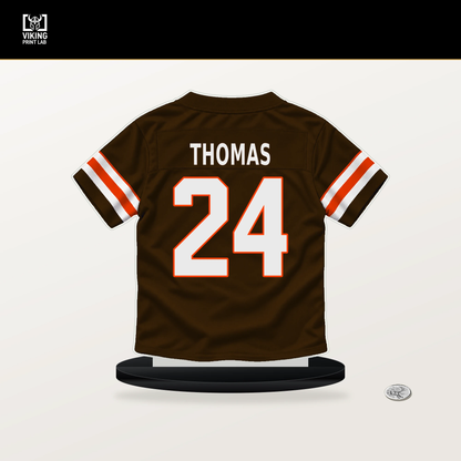 Daniel Thomas number 24 Cleveland Browns jersey stand with included black base.