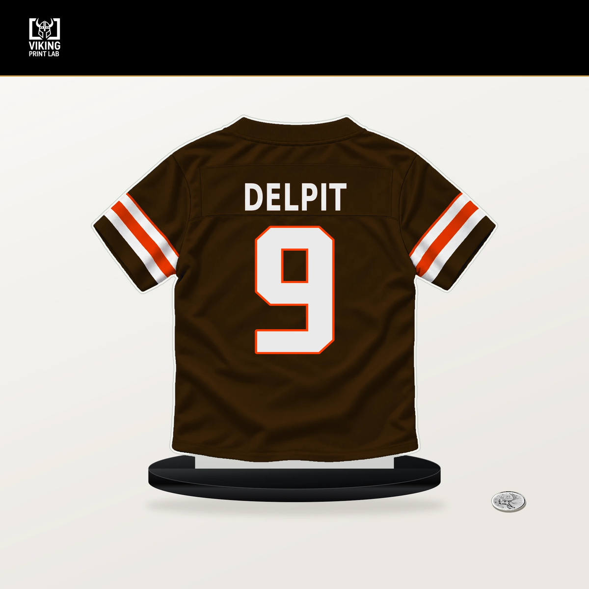 Grant Delpit number 9 Cleveland Browns jersey stand with included black base.