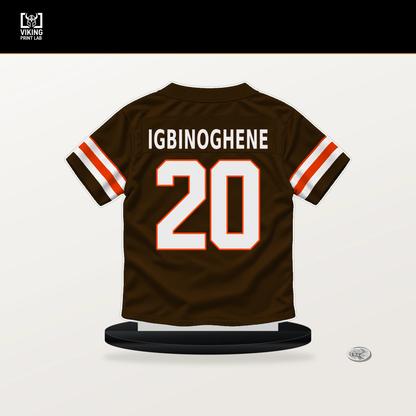 Noah Igbinoghene number 20 Cleveland Browns jersey stand with included black base.