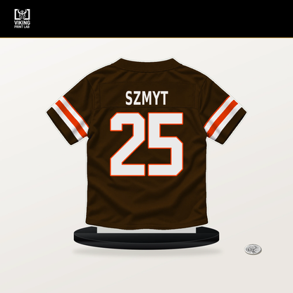 Andre Szmyt number 25 Cleveland Browns jersey stand with included black base.