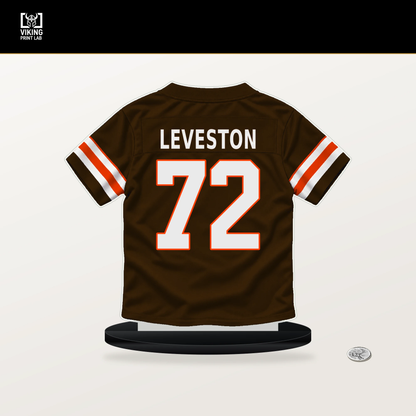 KT Leveston number 72 Cleveland Browns jersey stand with included black base.