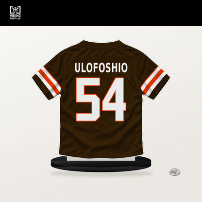 Edefuan Ulofoshio number 54 Cleveland Browns jersey stand with included black base.