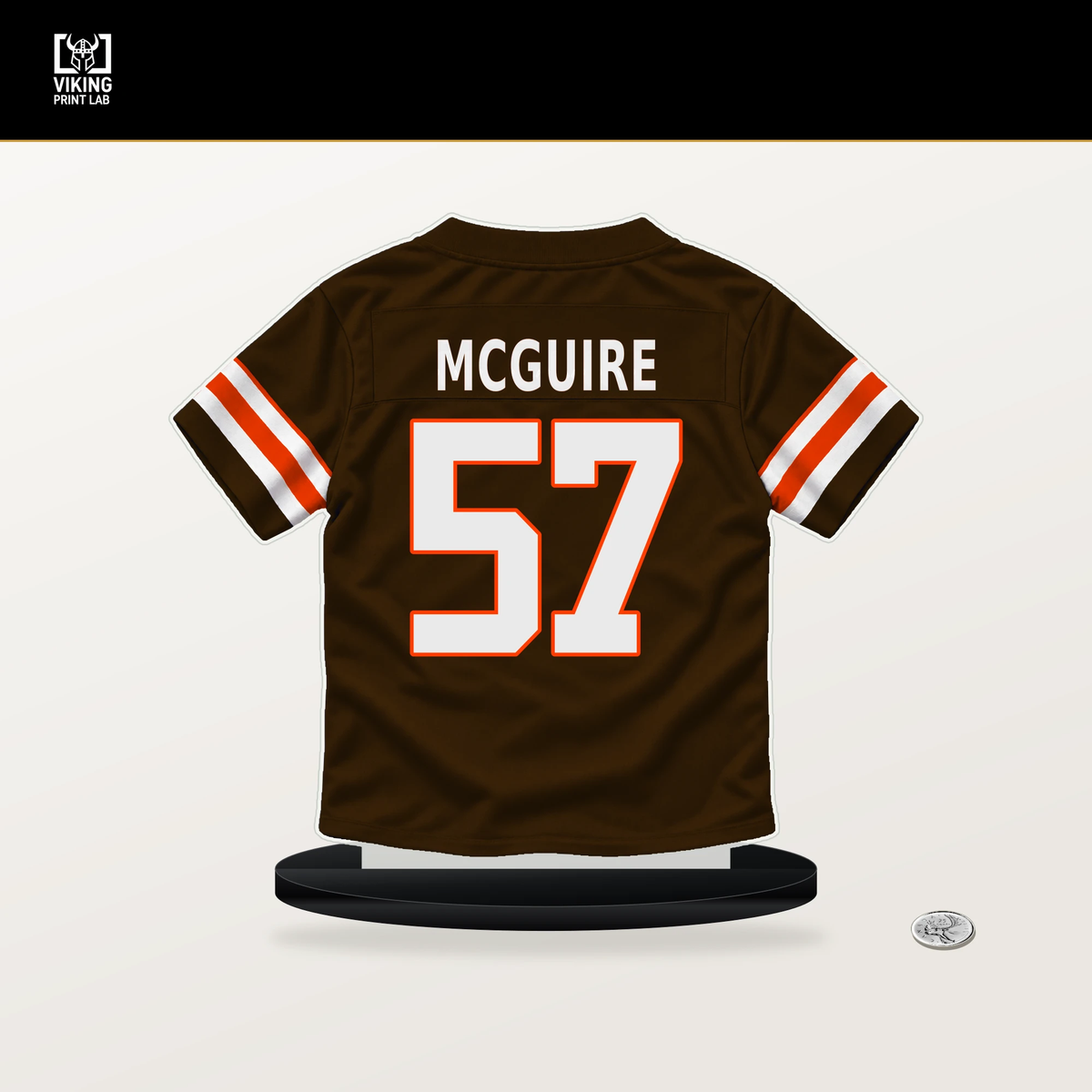 Isaiah McGuire number 57 Cleveland Browns jersey stand with included black base.