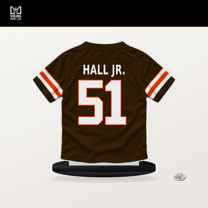 Mike Hall Jr. number 51 Cleveland Browns jersey stand with included black base.
