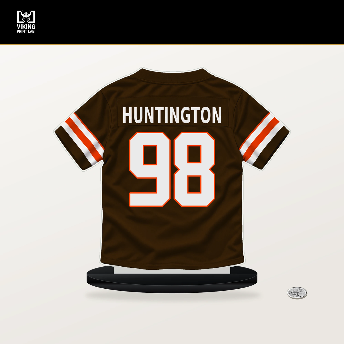 Adin Huntington number 98 Cleveland Browns jersey stand with included black base.