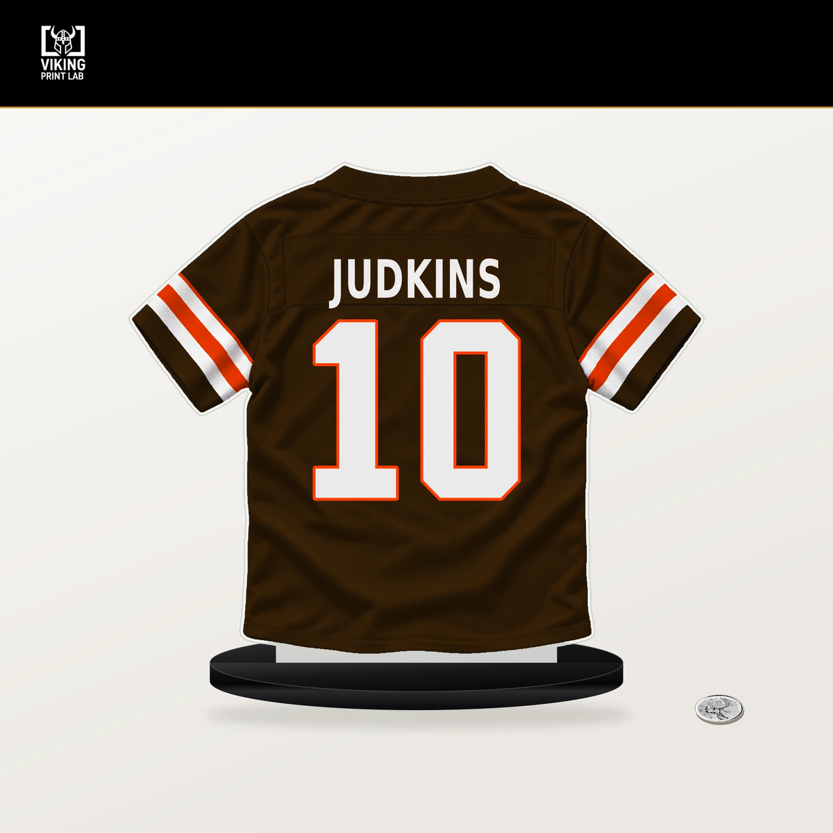 Quinshon Judkins number 10 Cleveland Browns jersey stand with included black base.