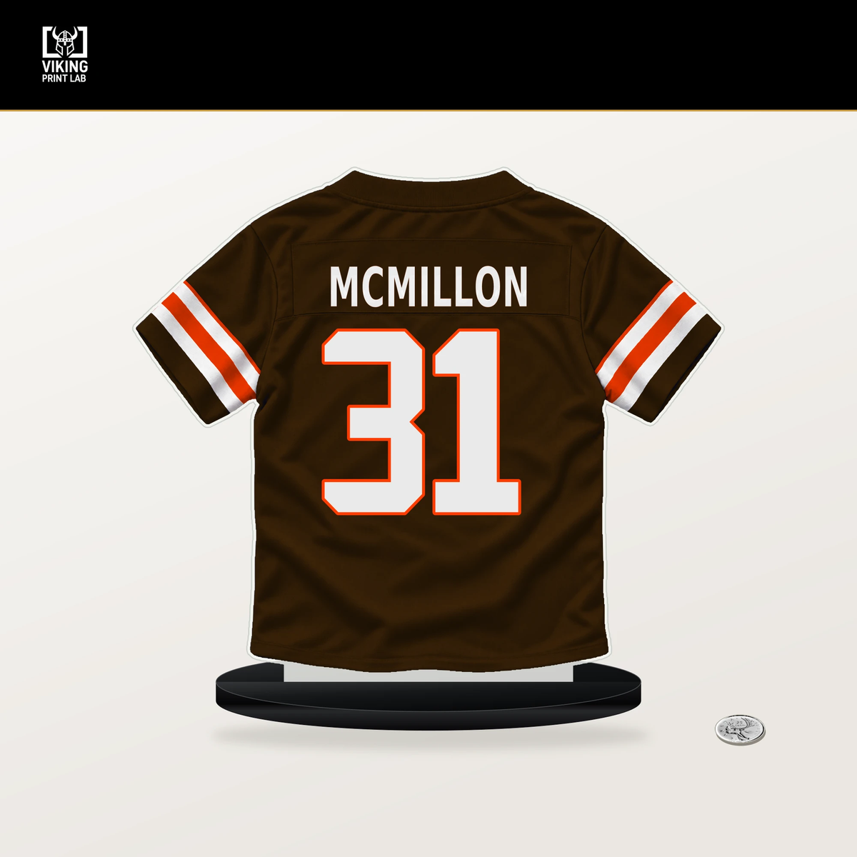 Donovan McMillon number 31 Cleveland Browns jersey stand with included black base.