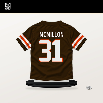 Donovan McMillon number 31 Cleveland Browns jersey stand with included black base.