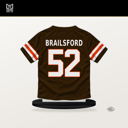 Parker Brailsford number 52 Cleveland Browns jersey stand with included black base.