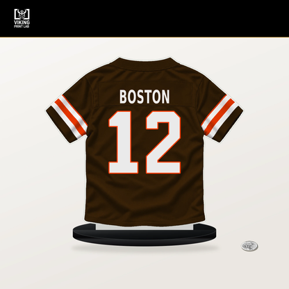 Denzel Boston number 12 Cleveland Browns jersey stand with included black base.