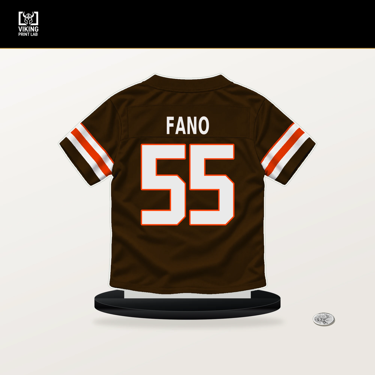 Spencer Fano number 55 Cleveland Browns jersey stand with included black base.