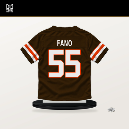 Spencer Fano number 55 Cleveland Browns jersey stand with included black base.