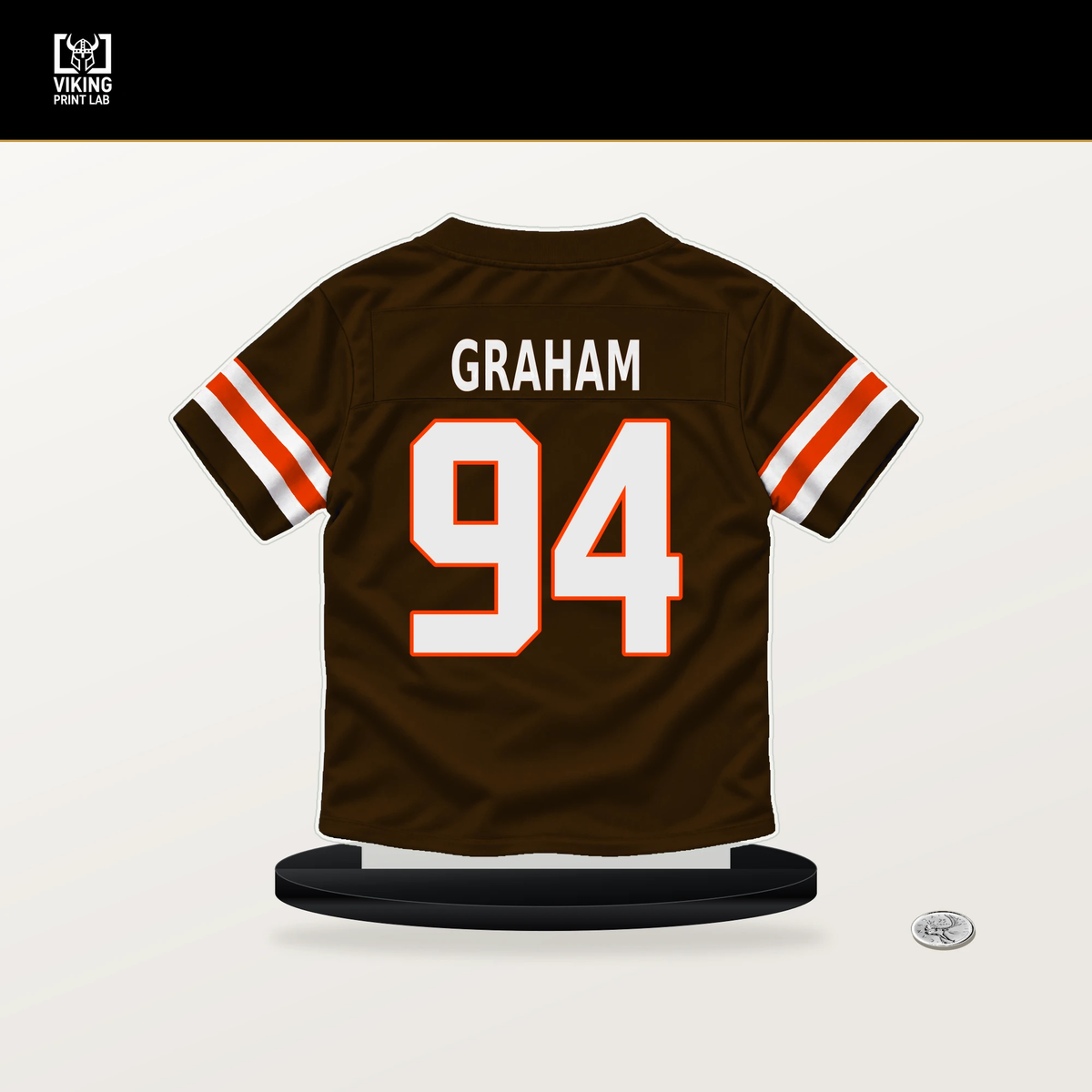 Mason Graham number 94 Cleveland Browns jersey stand with included black base.