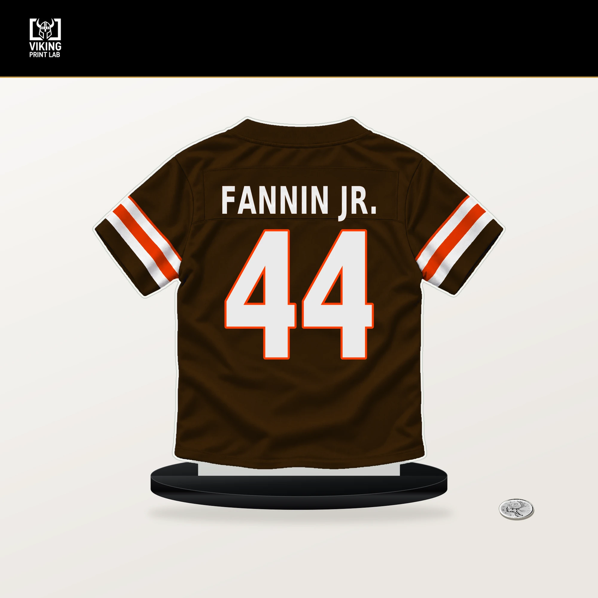 Harold Fannin Jr. number 44 Cleveland Browns jersey stand with included black base.