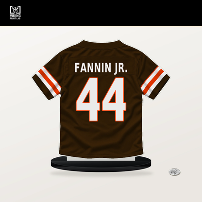Harold Fannin Jr. number 44 Cleveland Browns jersey stand with included black base.