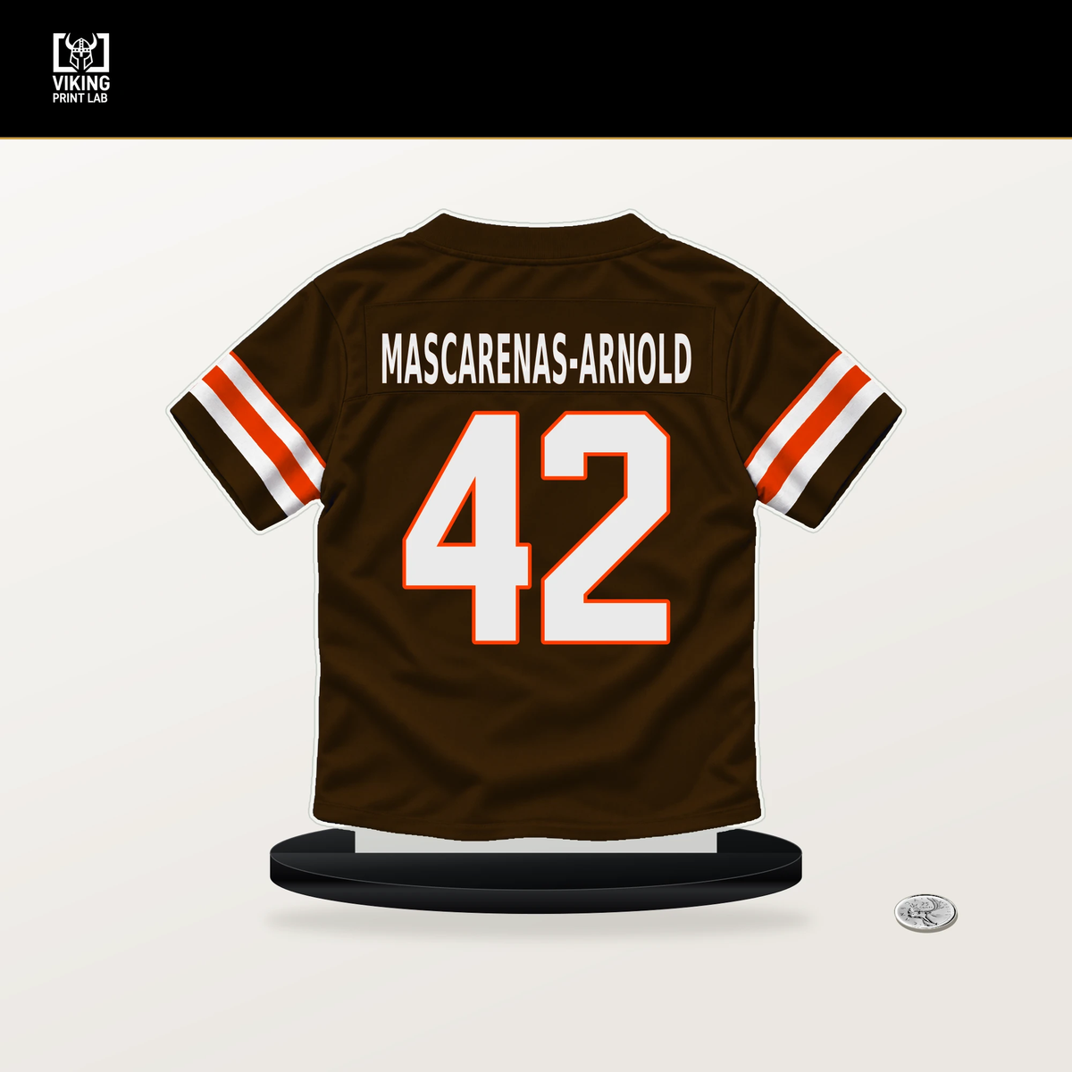 Easton Mascarenas-Arnold number 42 Cleveland Browns jersey stand with included black base.