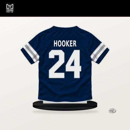 Malik Hooker number 24 Dallas Cowboys jersey stand with included black base.