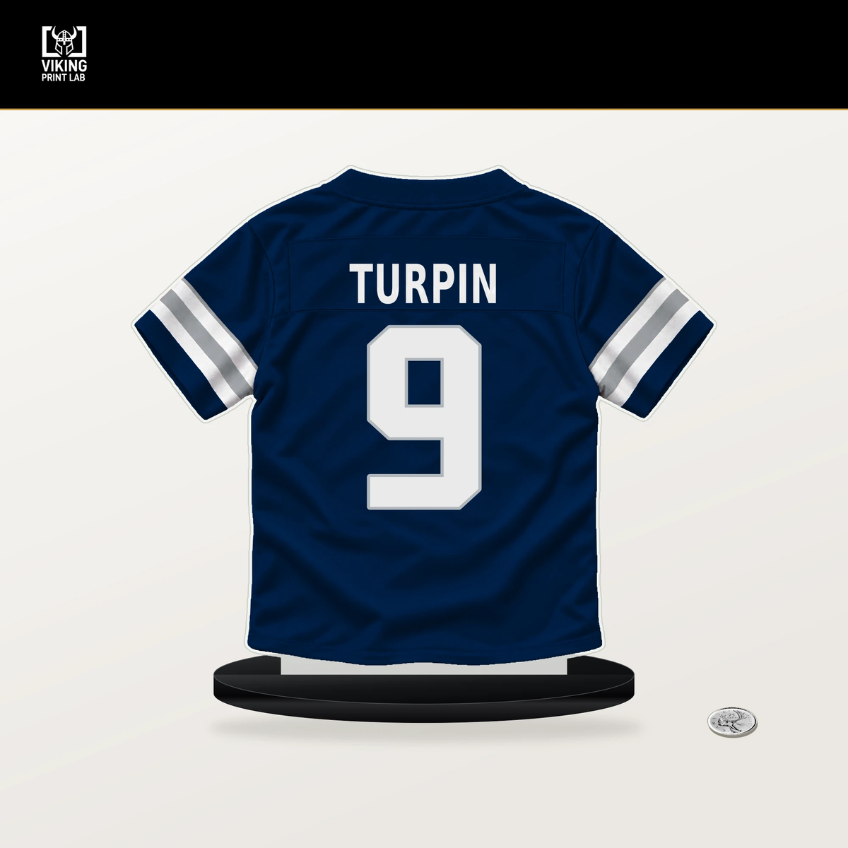 KaVontae Turpin number 9 Dallas Cowboys jersey stand with included black base.