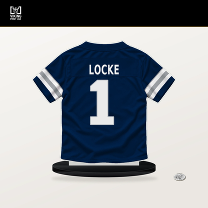 P.J. Locke number 1 Dallas Cowboys jersey stand with included black base.