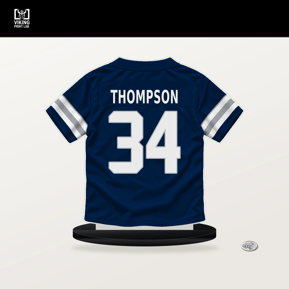 Jalen Thompson number 34 Dallas Cowboys jersey stand with included black base.