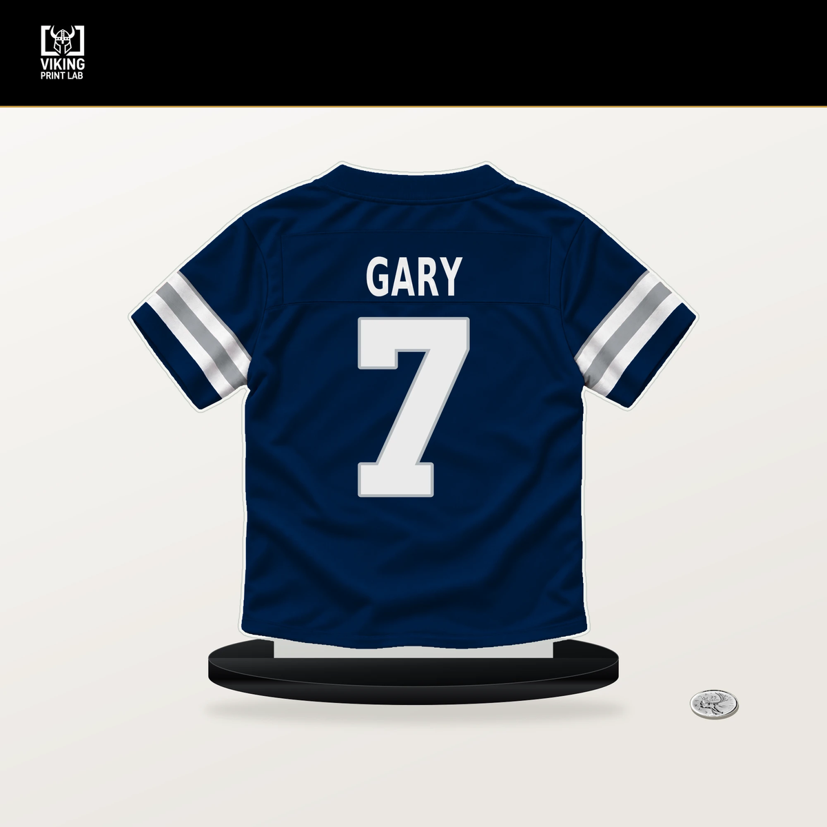 Rashan Gary number 7 Dallas Cowboys jersey stand with included black base.