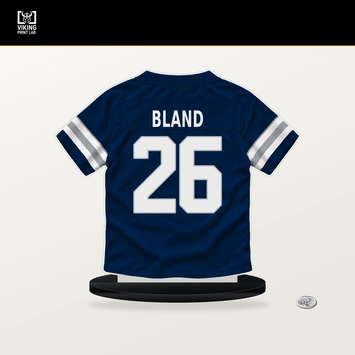 DaRon Bland number 26 Dallas Cowboys jersey stand with included black base.