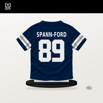 Brevyn Spann-Ford number 89 Dallas Cowboys jersey stand with included black base.