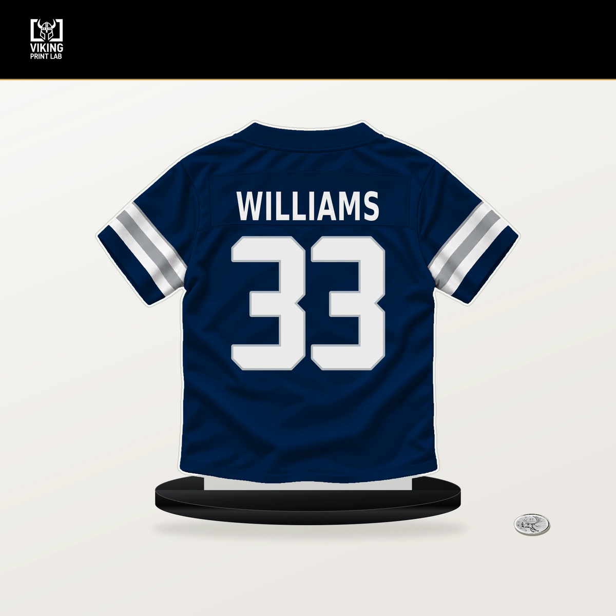 Javonte Williams number 33 Dallas Cowboys jersey stand with included black base.