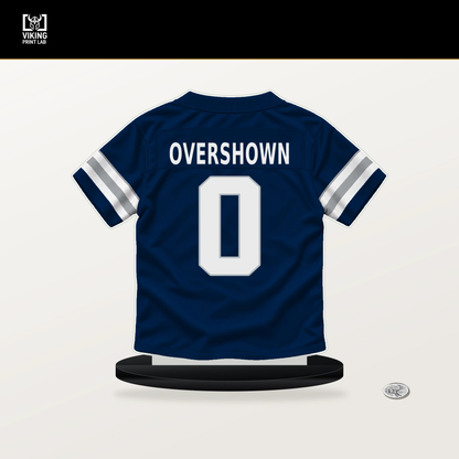 DeMarvion Overshown number 0 Dallas Cowboys jersey stand with included black base.