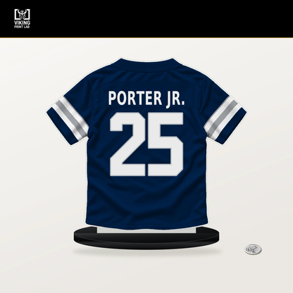 Joey Porter Jr. number 25 Dallas Cowboys jersey stand with included black base.