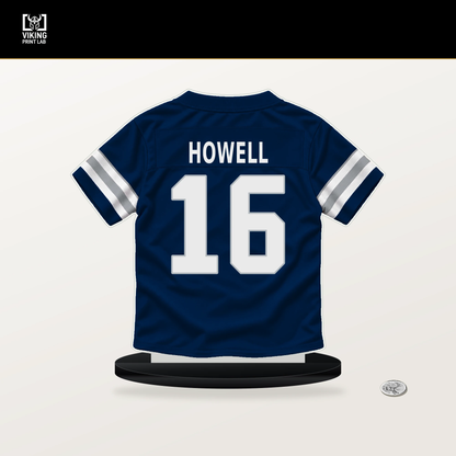 Sam Howell number 16 Dallas Cowboys jersey stand with included black base.