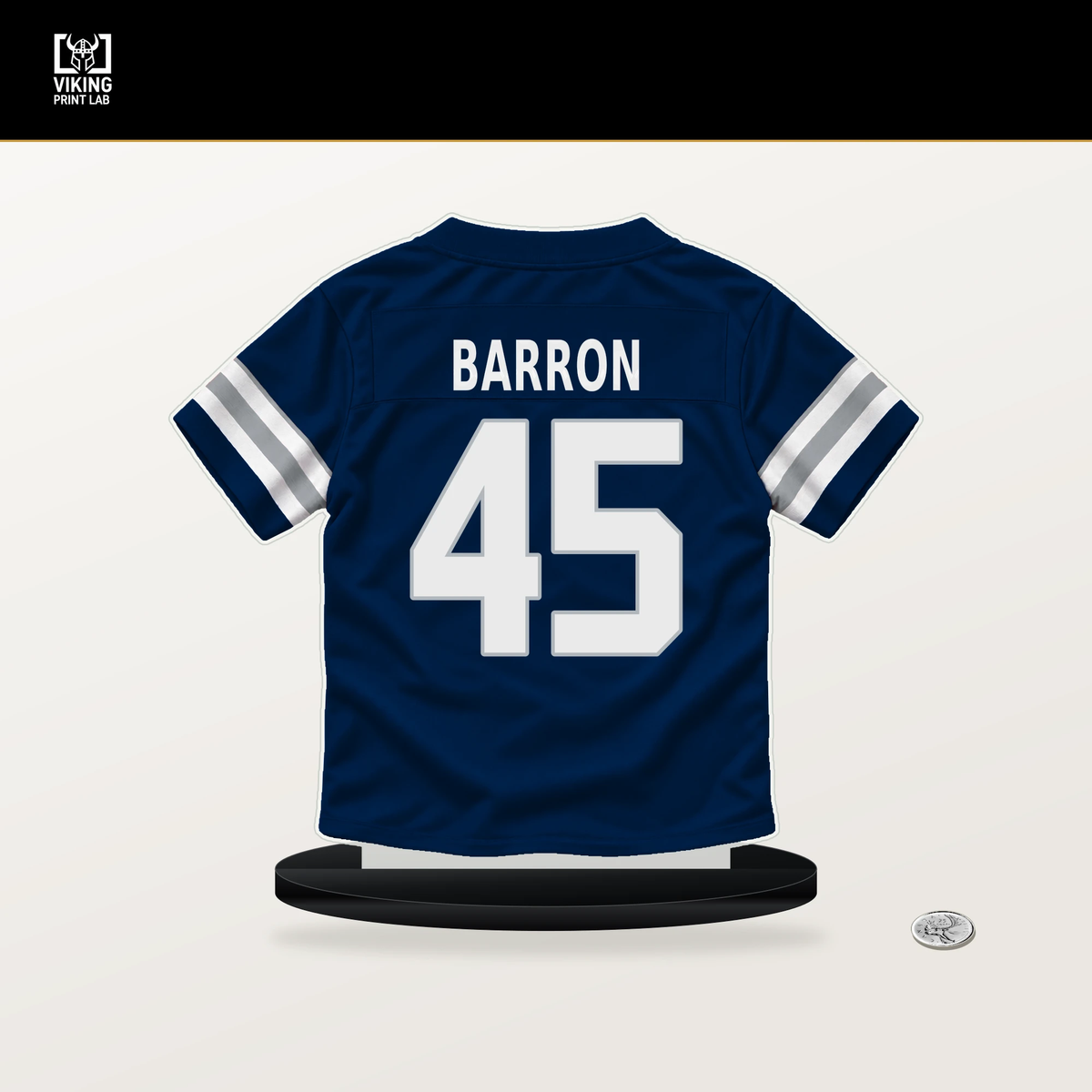 Justin Barron number 45 Dallas Cowboys jersey stand with included black base.