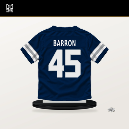 Justin Barron number 45 Dallas Cowboys jersey stand with included black base.