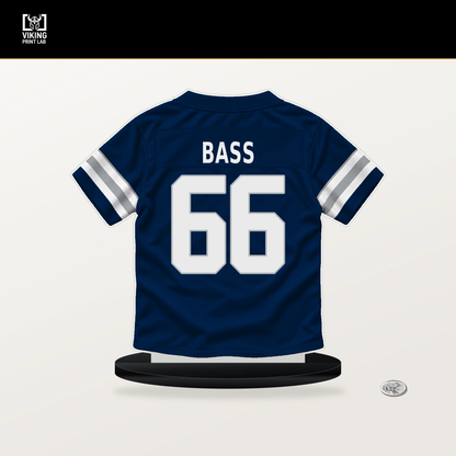 T.J. Bass number 66 Dallas Cowboys jersey stand with included black base.
