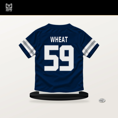Tyrus Wheat number 59 Dallas Cowboys jersey stand with included black base.