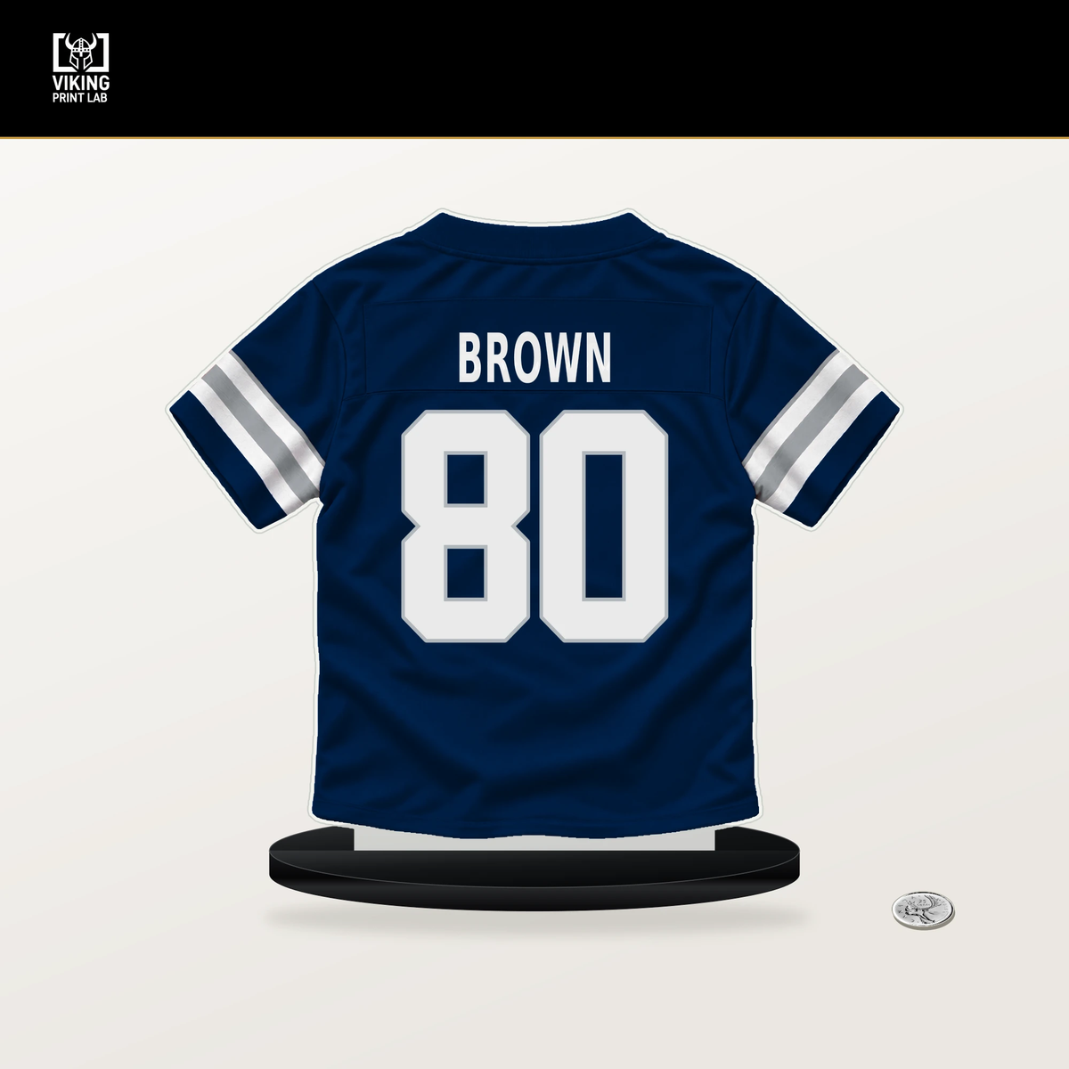 Camden Brown number 80 Dallas Cowboys jersey stand with included black base.