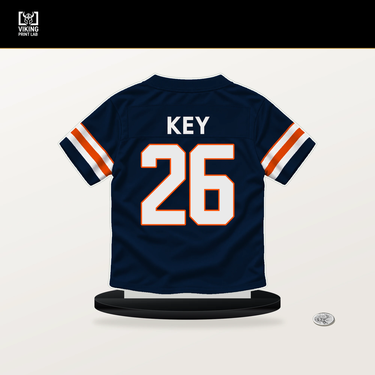 Devon Key number 26 Denver Broncos jersey stand with included black base.