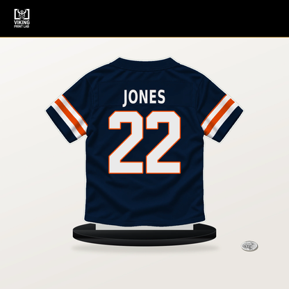 Brandon Jones number 22 Denver Broncos jersey stand with included black base.