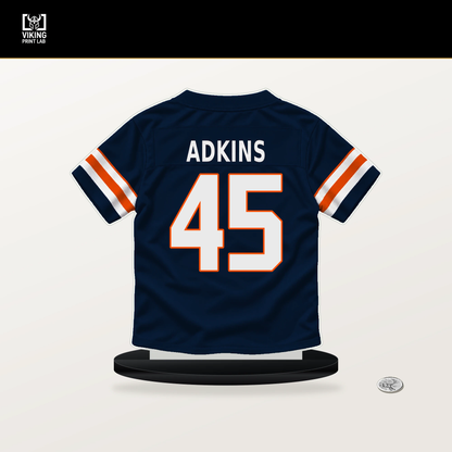 Nate Adkins number 45 Denver Broncos jersey stand with included black base.